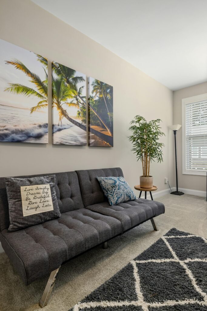 A modern living room designed by a popular interior design company, showcasing their portfolio of stylish and contemporary residential projects.